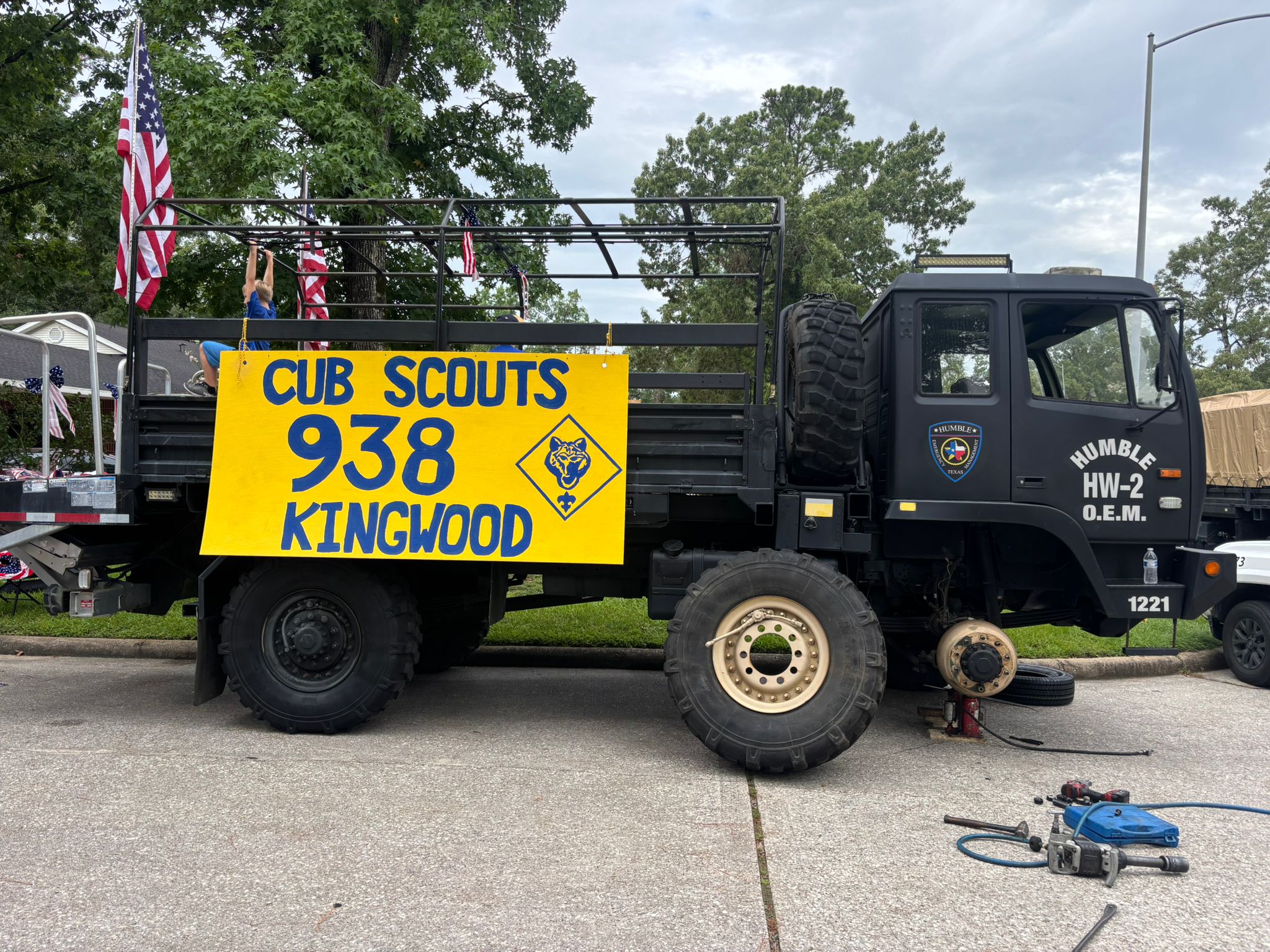 Mobile tire replacement on a big tuck. Cub Scouts Kingwood